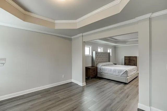 a bathroom with a double vanity sink mirror and toilet