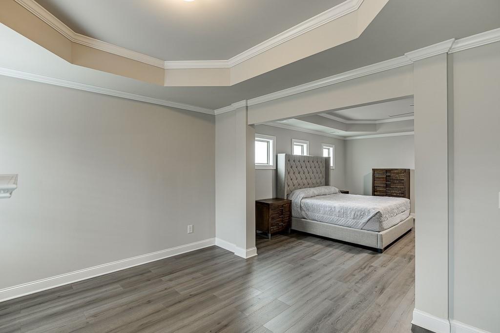 914 Rainsong Court Braselton, GA 30517 - Photo 22 of 37 a bedroom with a bed and window