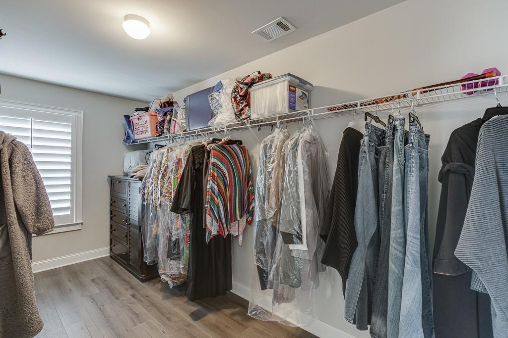 914 Rainsong Court Braselton, GA 30517 - Photo 24 of 37 a view of a walk in closet