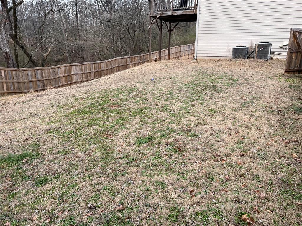 914 Rainsong Court Braselton, GA 30517 - Photo 34 of 37 a backyard of a house