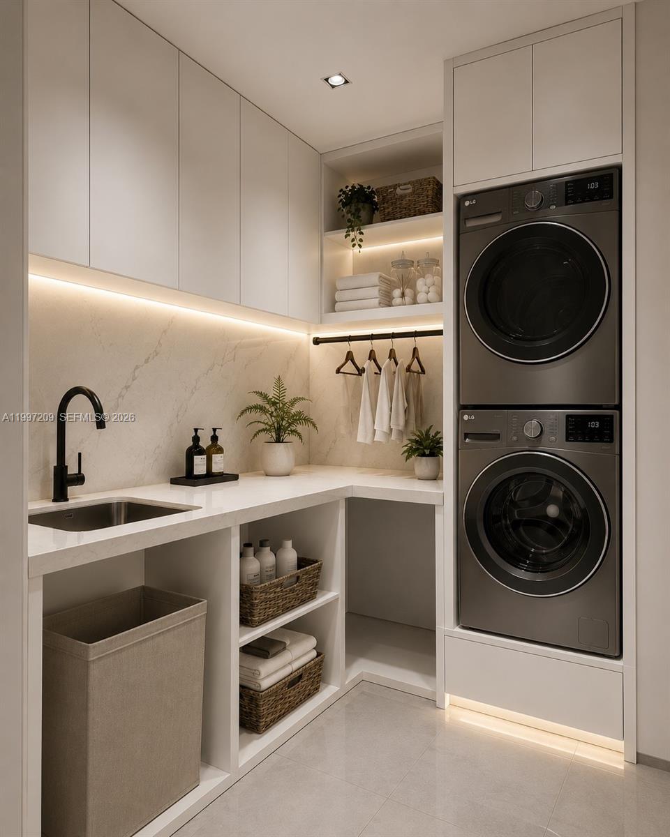 5912 Southwest 33rd Street Miami, FL 33155 - Photo 8 of 16 a utility room with sink dryer and washer