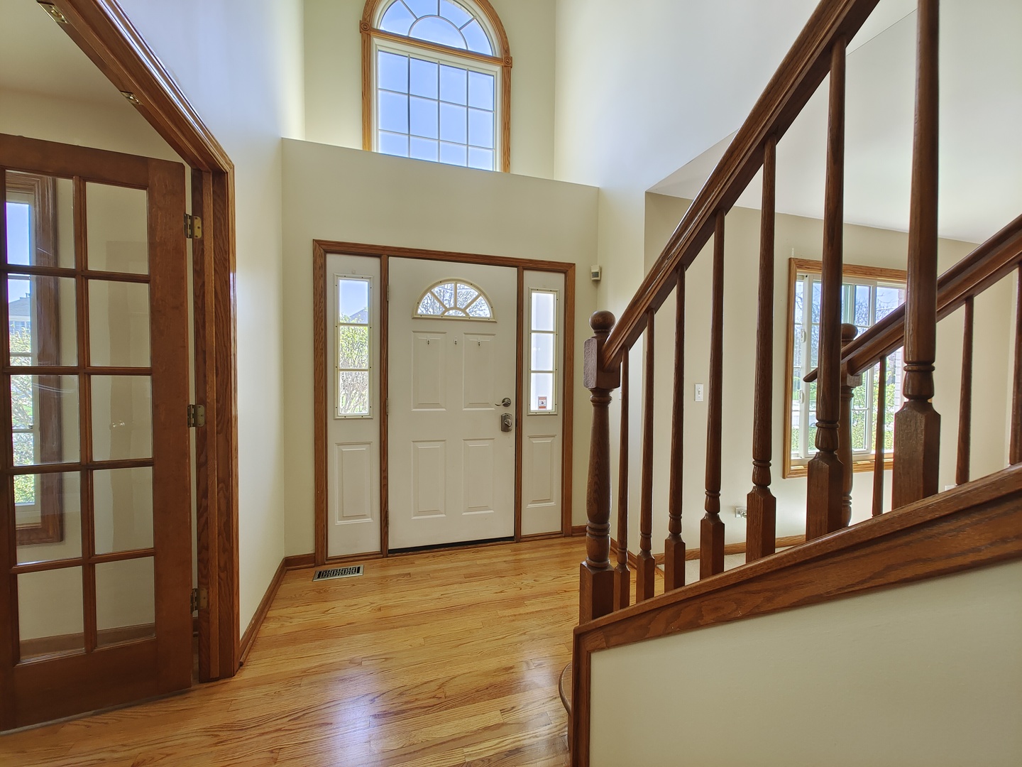 4807 Snapjack Circle Naperville, IL 60564 - Photo 3 of 29 a view of staircase with lots of wooden floor and windows