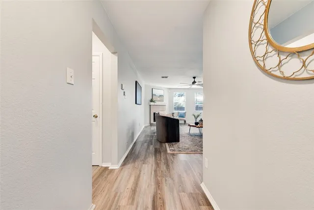a view of kitchen and living room with a window