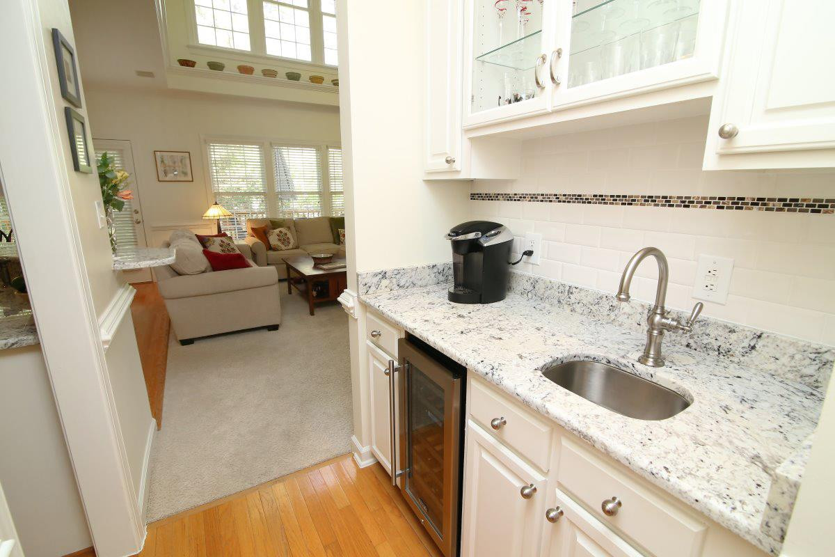122 Spring Valley Lane Durham, NC 27713 - Photo 11 of 25 Newly upgraded with back splash, new cabinets, granite countertops, wine cooler. Wet Bar