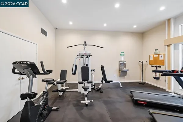 a view of a room with gym equipment