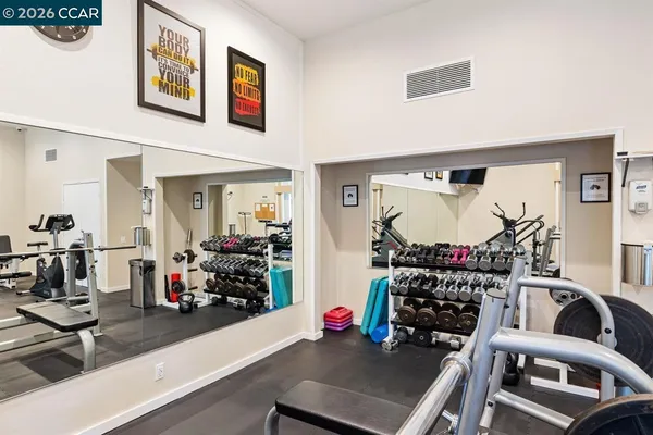 a view of a room with gym equipment