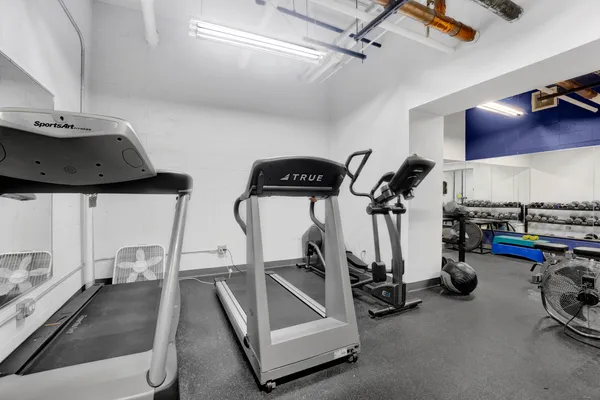 a view of a room with gym equipment