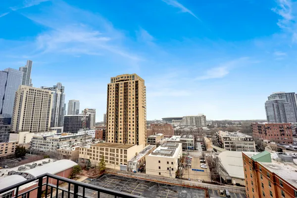 a view of city with tall buildings