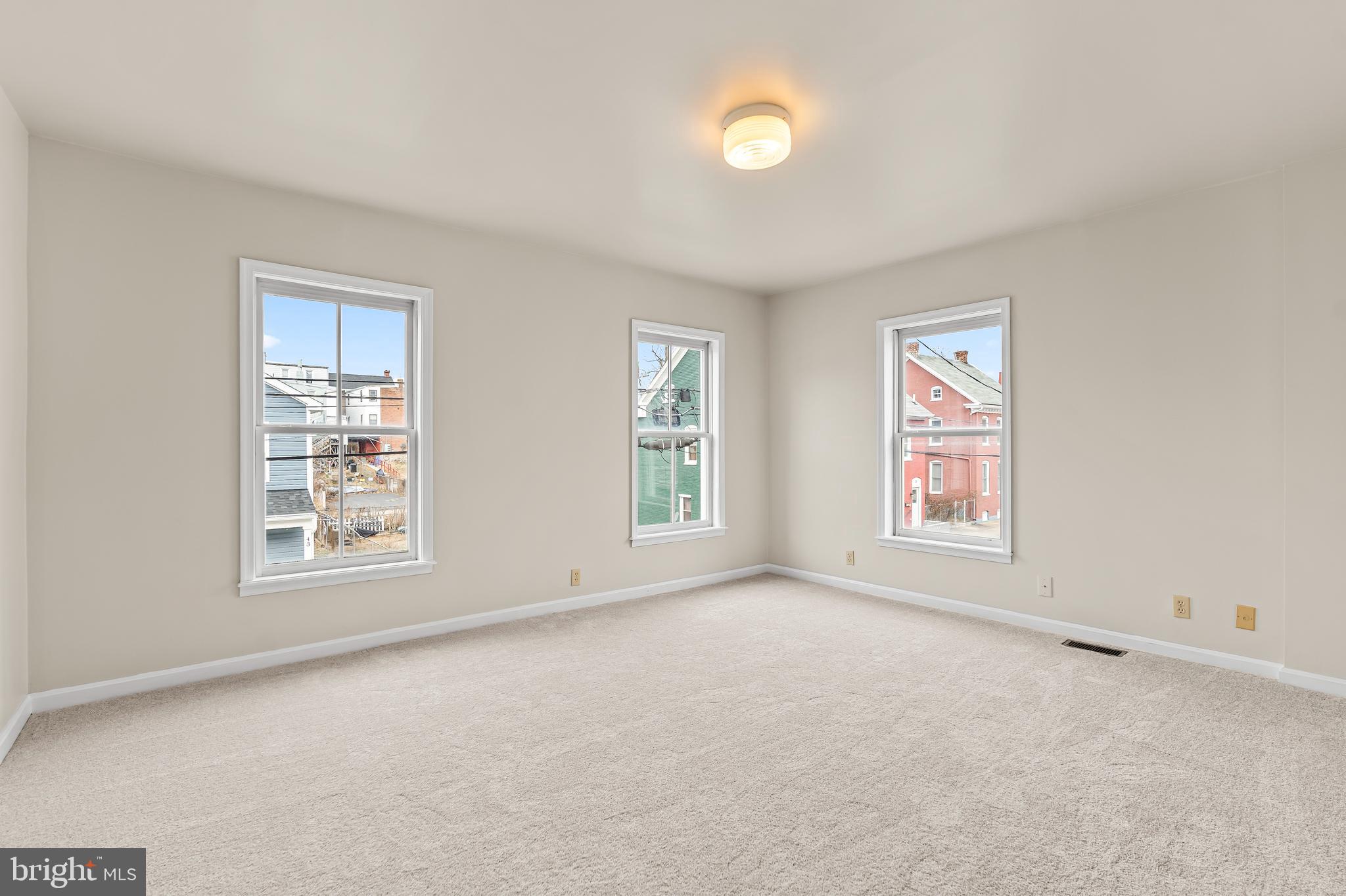 44 Madison Avenue Hagerstown, MD 21740 - Photo 17 of 24 an empty room with windows