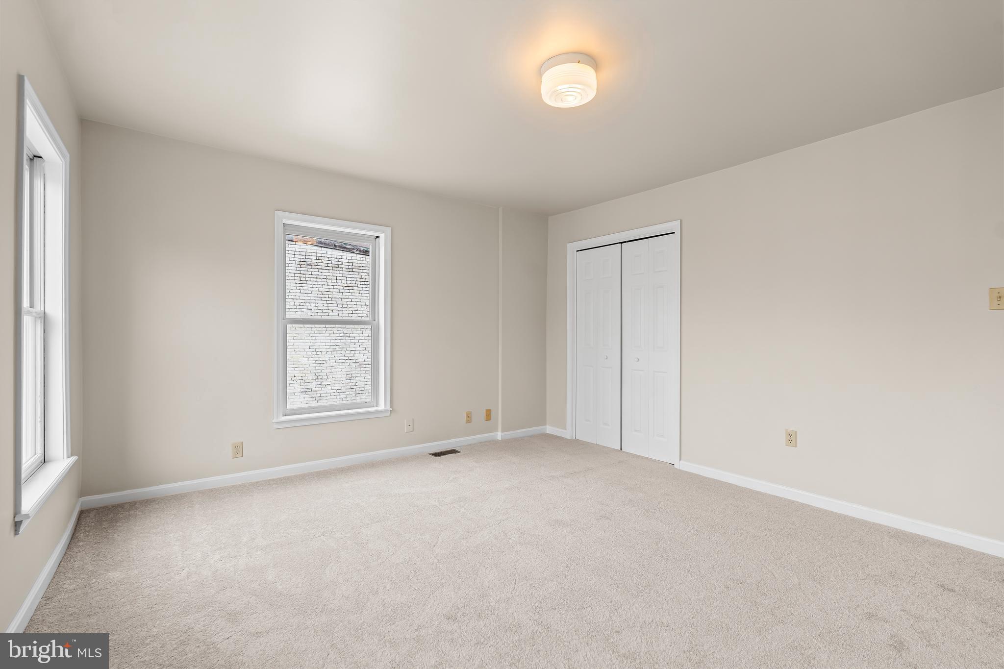 44 Madison Avenue Hagerstown, MD 21740 - Photo 18 of 24 an empty room with windows