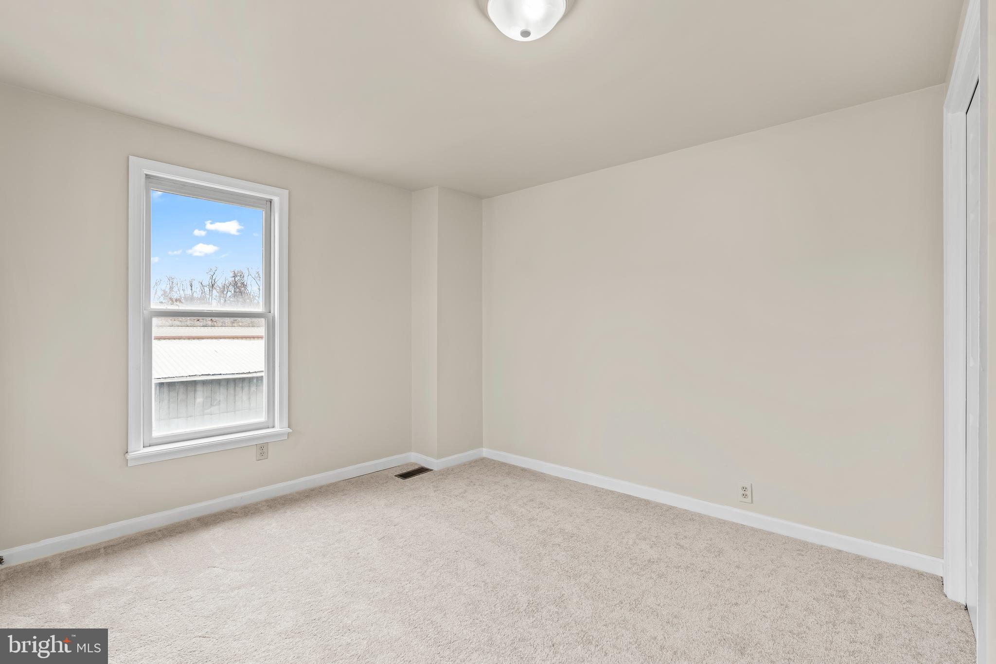 44 Madison Avenue Hagerstown, MD 21740 - Photo 22 of 24 an empty room with windows and closet