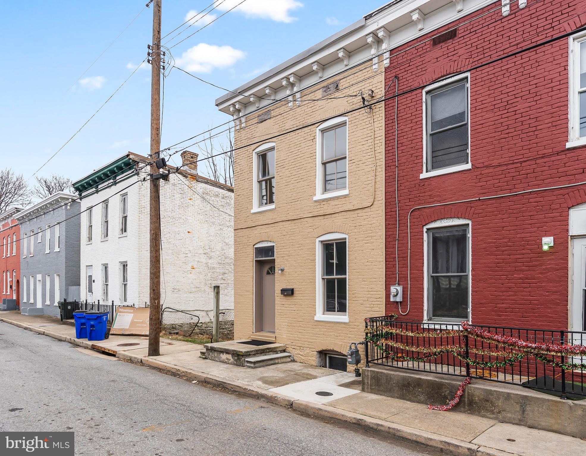44 Madison Avenue Hagerstown, MD 21740 - Photo 3 of 24 a view of a building with a street