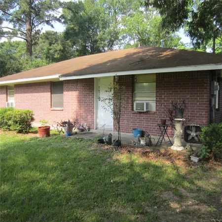 a backyard of a house with seating space