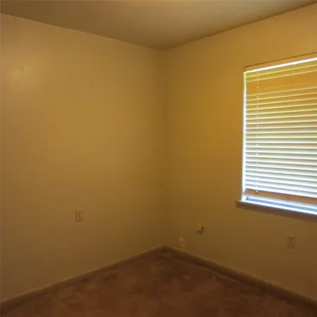 a view of a small space with a window