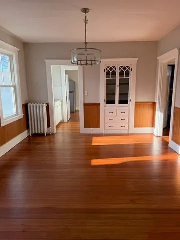 a view of kitchen with furniture and window