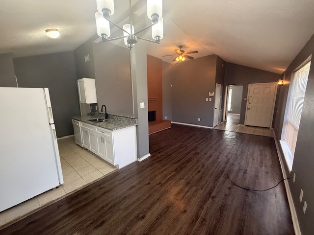 22320 Tree House Lane Spring, TX 77373 - Photo 3 of 10 a view of kitchen with sink microwave and refrigerator
