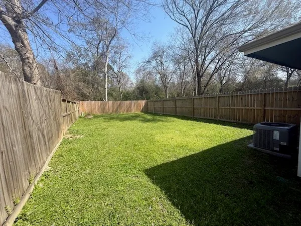 a view of a backyard with a garden