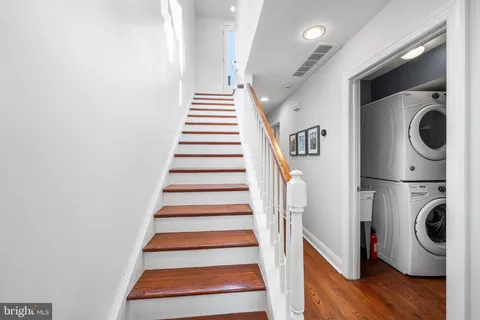 a view of entryway with wooden floor
