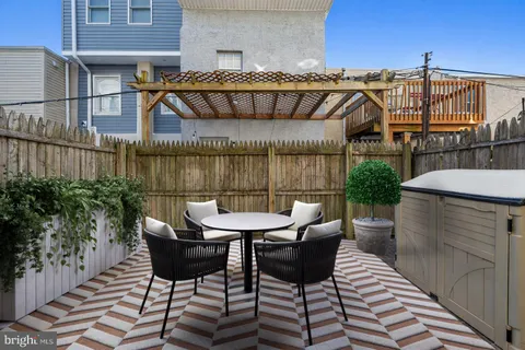 a view of a chairs and table on the terrace