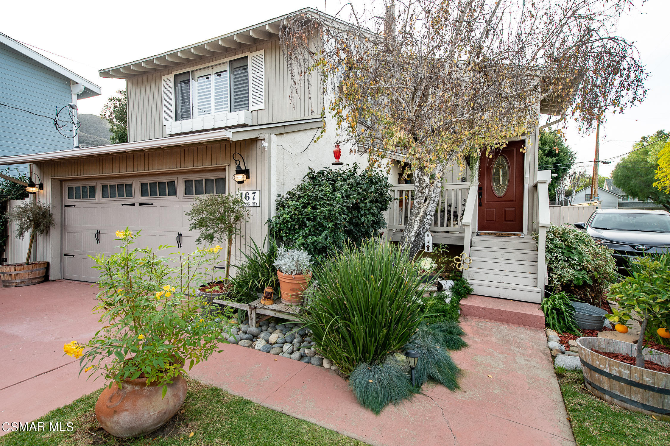 167 Brook Road Newbury Park, CA 91320 - Photo 1 of 30 a front view of a house with plants
