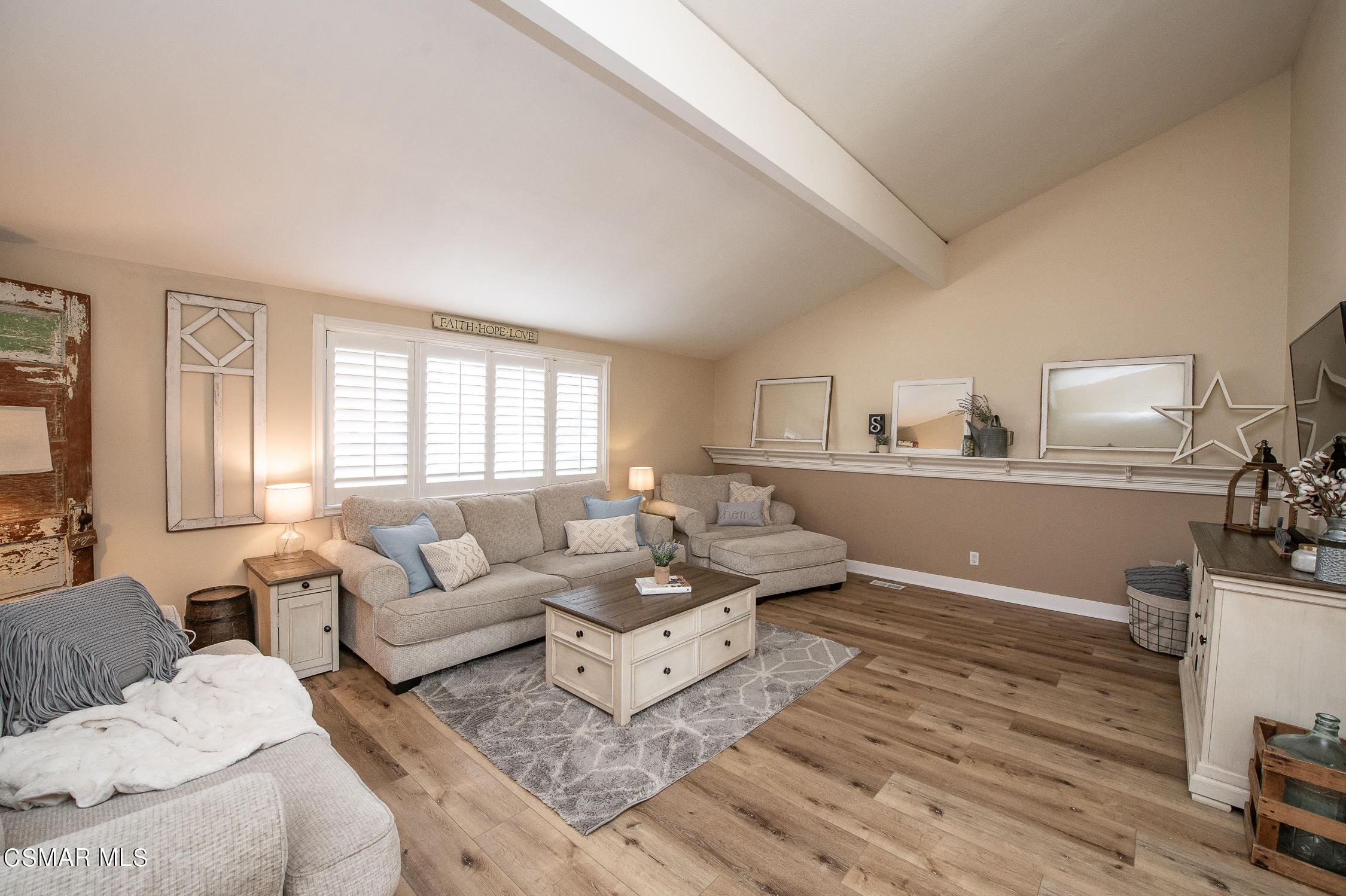 167 Brook Road Newbury Park, CA 91320 - Photo 3 of 30 a living room with furniture and a wooden floor