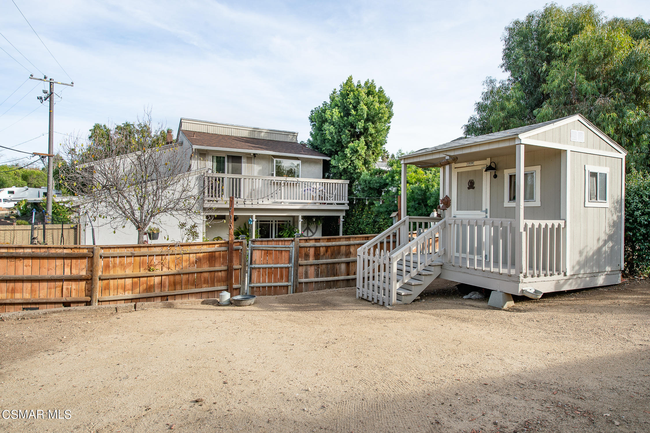 167 Brook Road Newbury Park, CA 91320 - Photo 29 of 30 a view of a house with a wooden deck and a yard