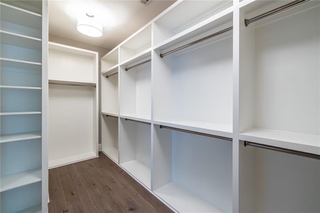 538 Ansley Street Decatur, GA 30030 - Photo 38 of 73 a view of walk in closet with empty racks