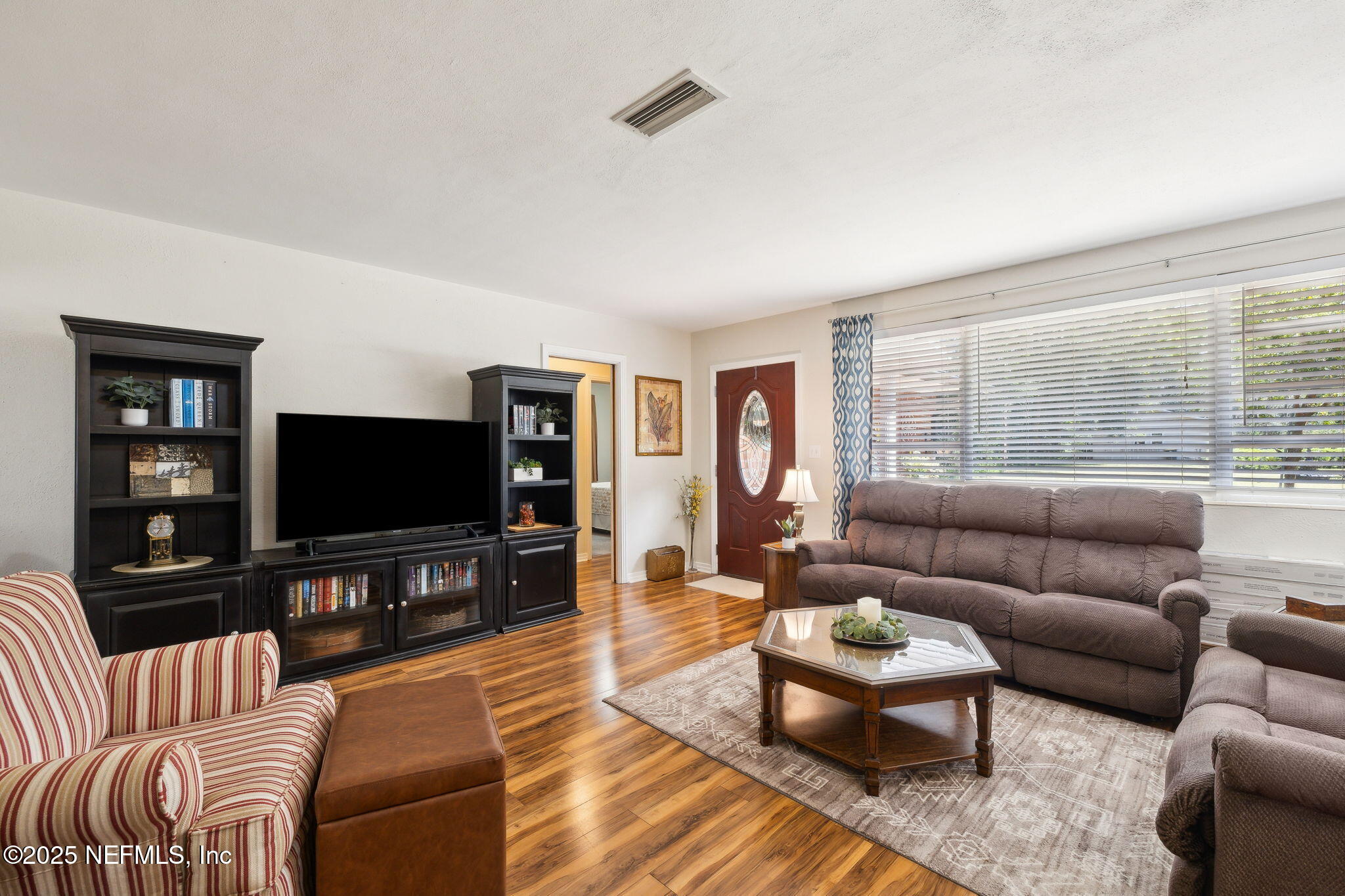 5114 Eulace Road Jacksonville, FL 32210 - Photo 12 of 48 Living room reverse