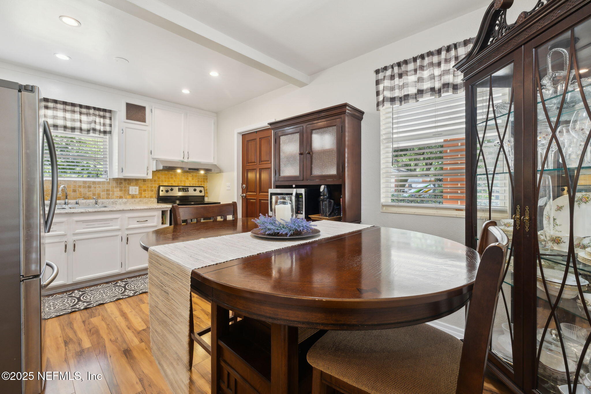 5114 Eulace Road Jacksonville, FL 32210 - Photo 15 of 48 Breakfast nook to kitchen