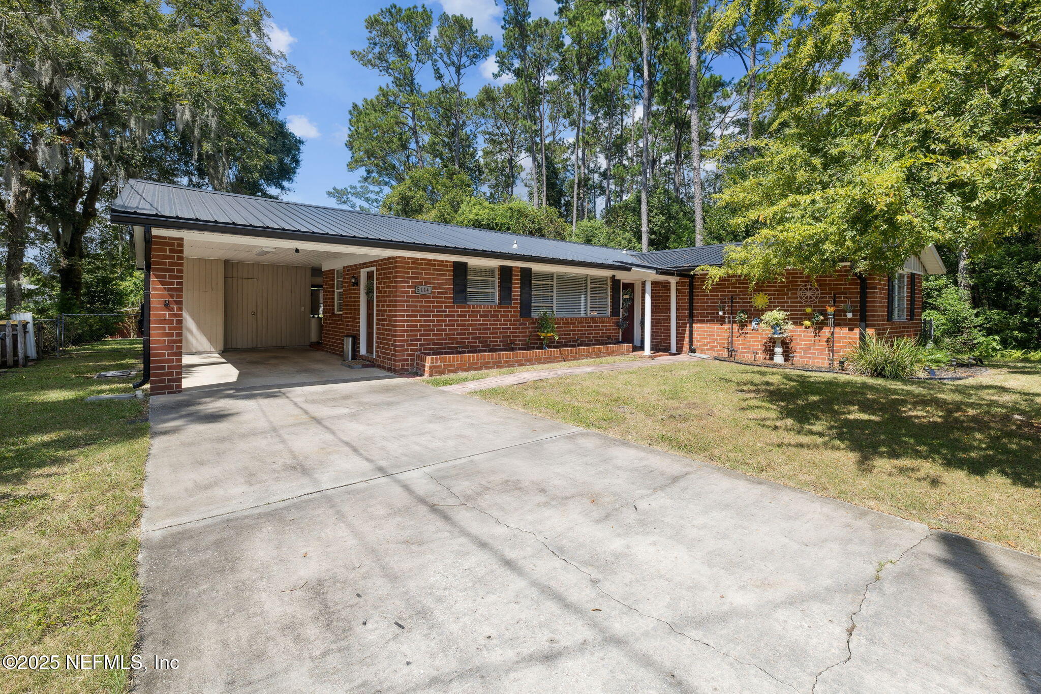 5114 Eulace Road Jacksonville, FL 32210 - Photo 7 of 48 Brick home with new metal roof
