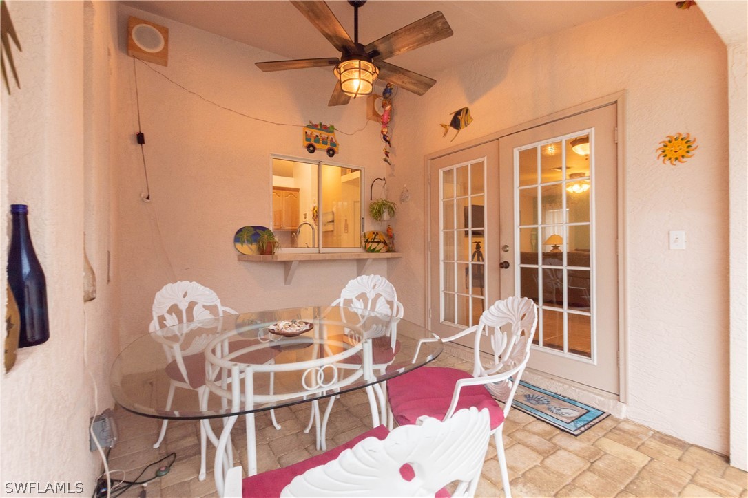 9115 Irving Road Fort Myers, FL 33967 - Photo 27 of 35 a dining room with furniture and window
