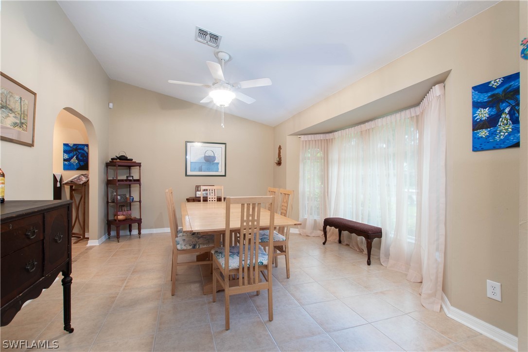 9115 Irving Road Fort Myers, FL 33967 - Photo 4 of 35 a view of a livingroom with furniture and chandelier
