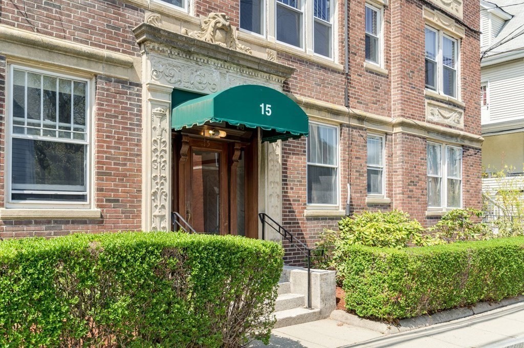 15 Colliston Road, Unit 9 Boston, MA 02135 - Photo 8 of 16 a front view of a house with a garden