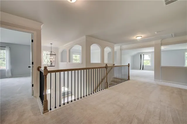 a view of empty room with windows