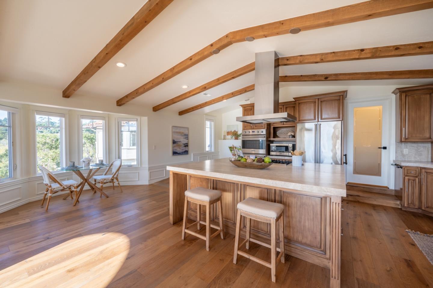 26345 Ladera Drive Carmel, CA 93923 - Photo 12 of 41 a dining room with furniture and wooden floor