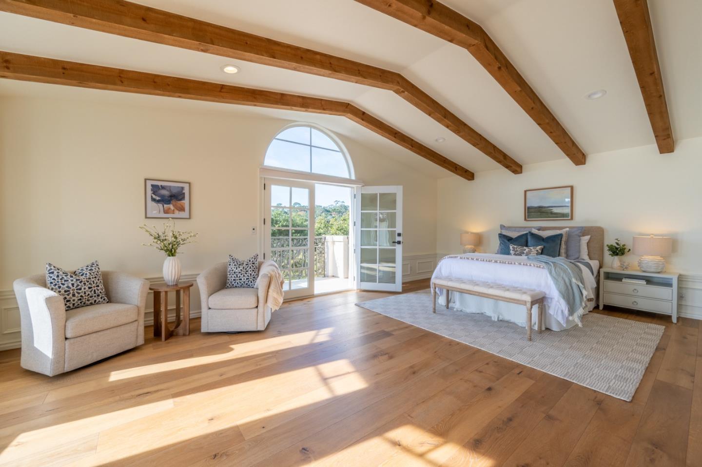 26345 Ladera Drive Carmel, CA 93923 - Photo 26 of 41 a bedroom with furniture and a large window