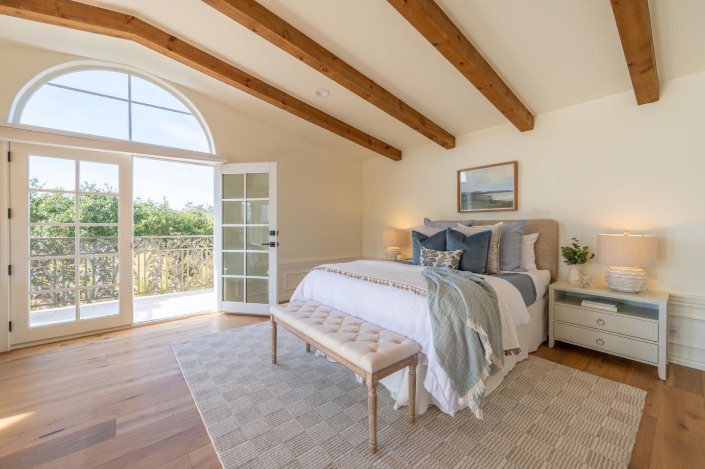 26345 Ladera Drive Carmel, CA 93923 - Photo 27 of 41 a spacious bedroom with a bed and a large window