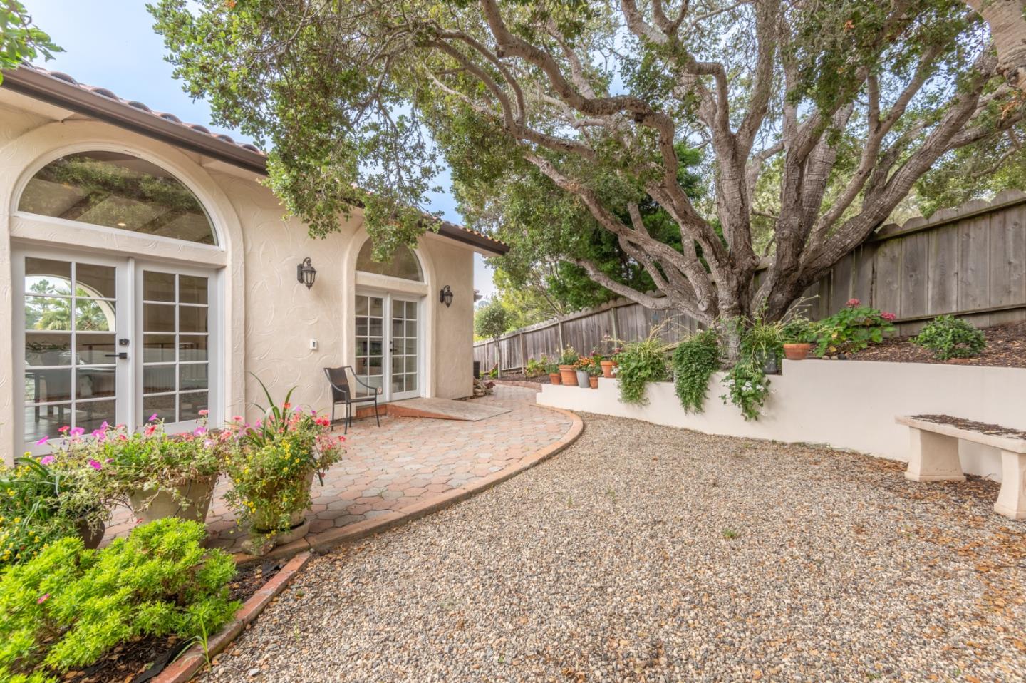 26345 Ladera Drive Carmel, CA 93923 - Photo 34 of 41 front view of a house with a yard and an trees