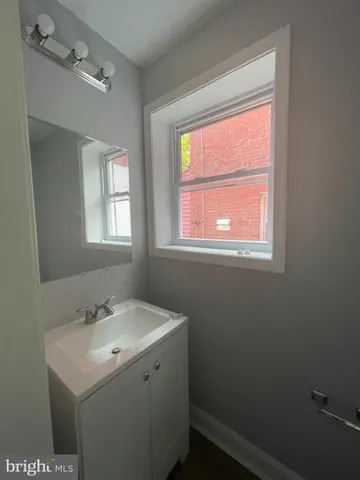 a bathroom with a sink and a vanity
