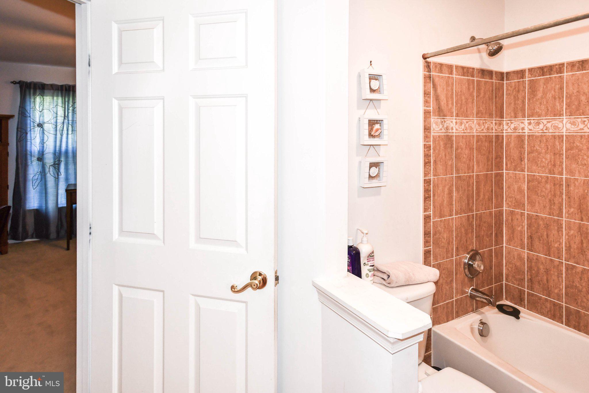 3208 Clavier Place Clinton, MD 20735 - Photo 30 of 55 Charming bathroom with warm tones.