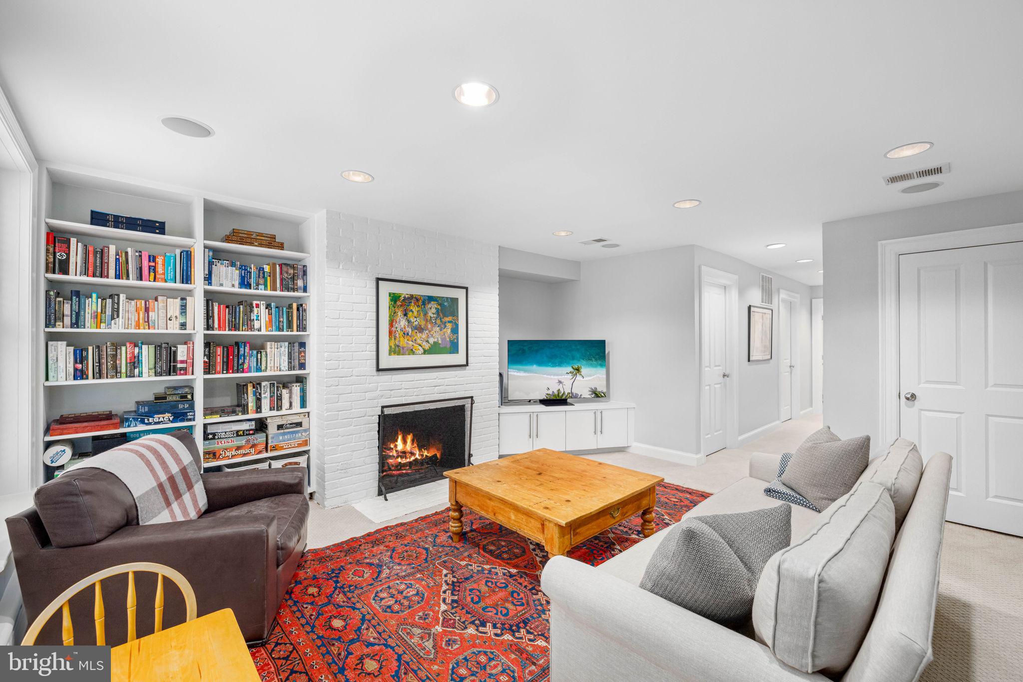 9 5th Street Southeast Washington, DC 20003 - Photo 27 of 38 Family room with fireplace and built-ins