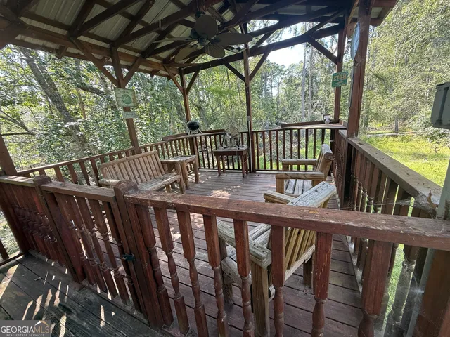 a view of a wooden deck and outdoor space