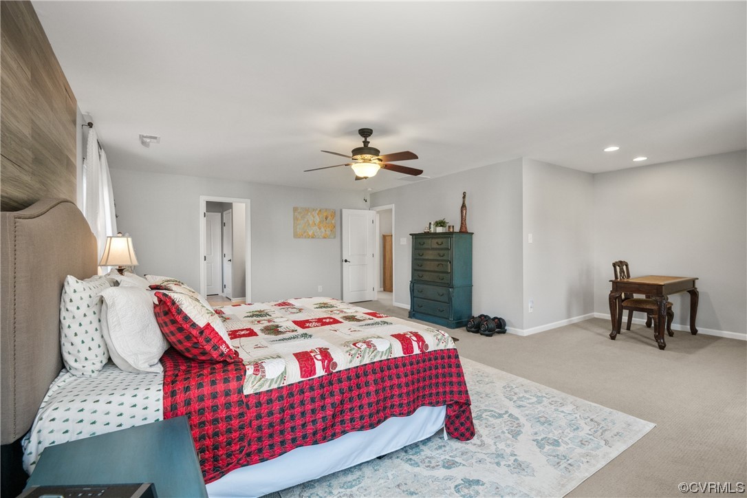 7031 Crackerberry Drive Moseley, VA 23120 - Photo 20 of 47 a bedroom with a bed and a table in it