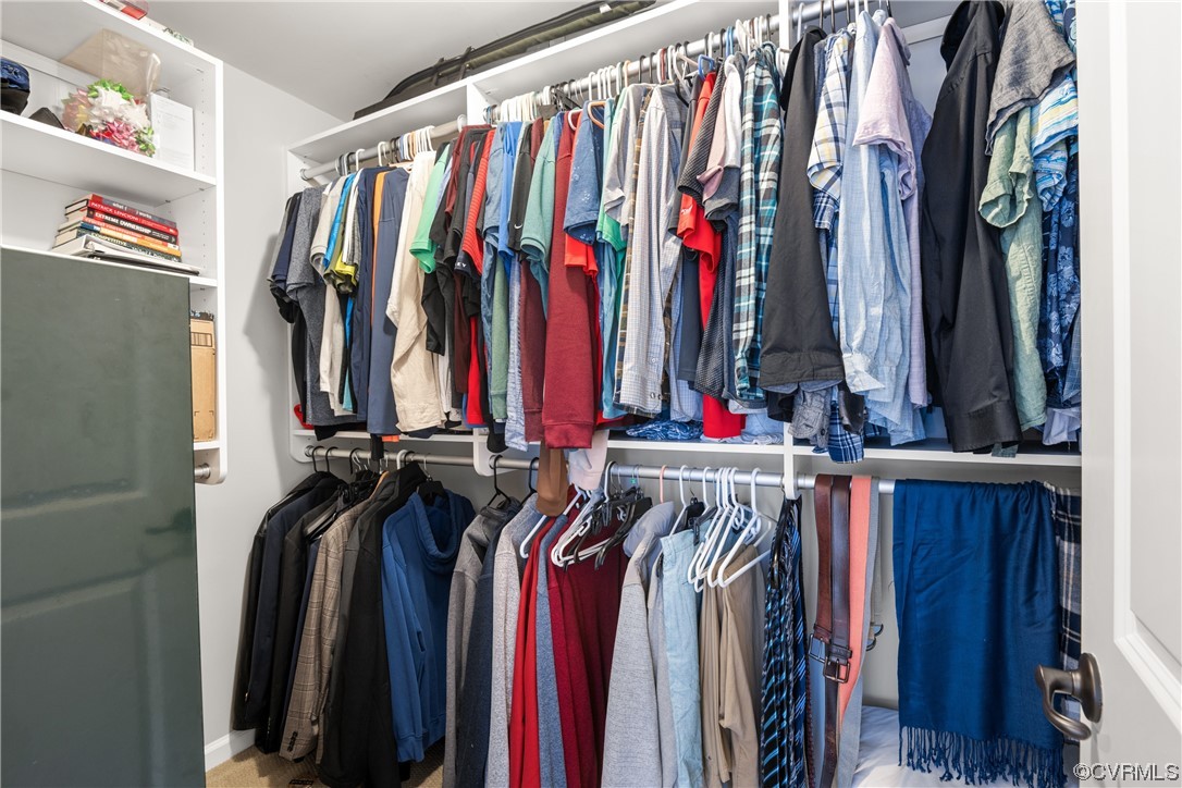 7031 Crackerberry Drive Moseley, VA 23120 - Photo 24 of 47 a view of walk in closet with clothes