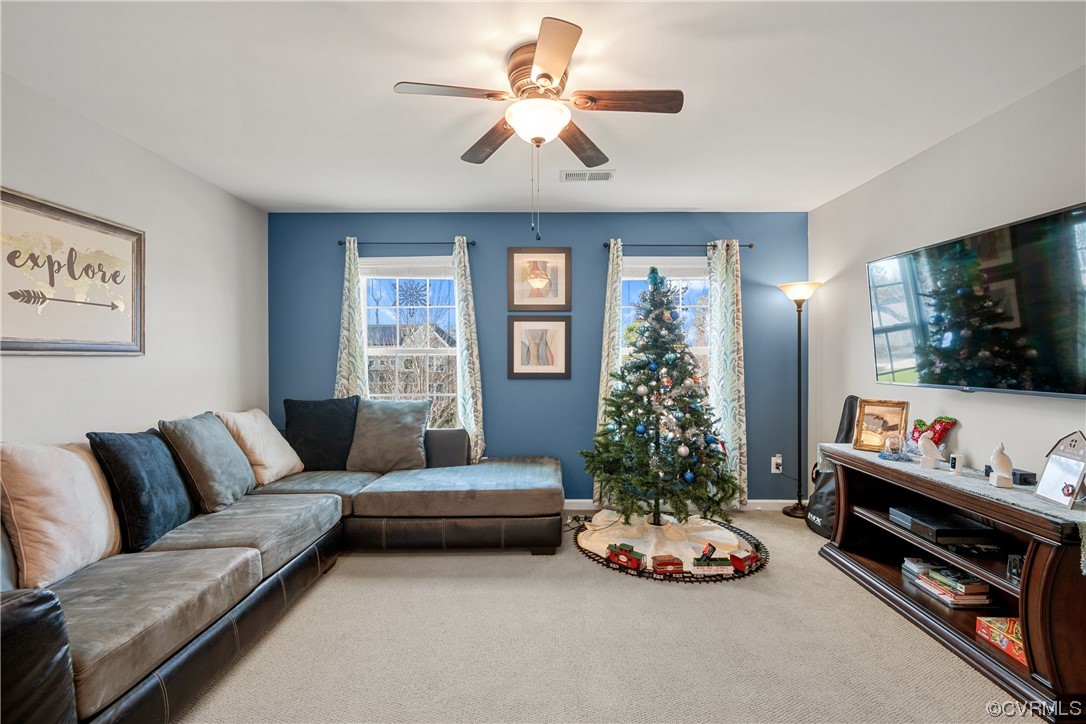 7031 Crackerberry Drive Moseley, VA 23120 - Photo 25 of 47 a living room with furniture and a flat screen tv