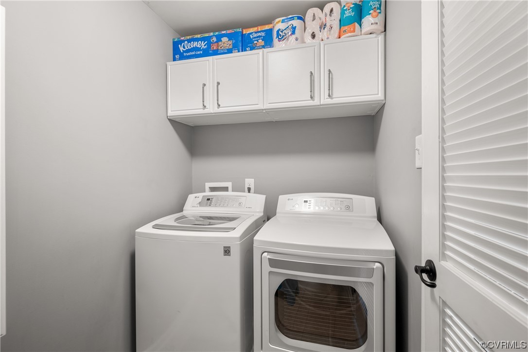 7031 Crackerberry Drive Moseley, VA 23120 - Photo 34 of 47 a utility room with dryer and washer