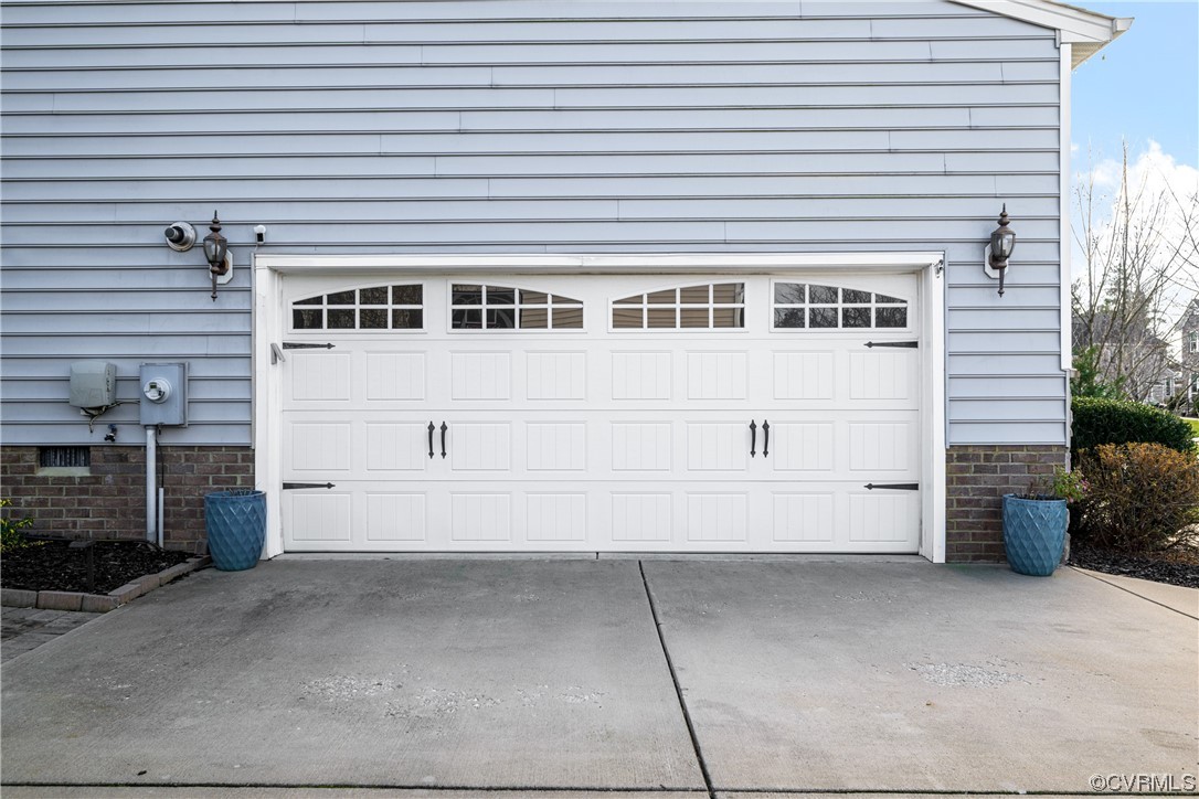 7031 Crackerberry Drive Moseley, VA 23120 - Photo 38 of 47 a view of a house with a parking space
