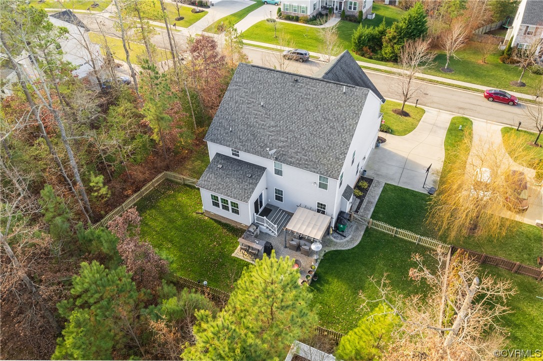 7031 Crackerberry Drive Moseley, VA 23120 - Photo 39 of 47 an aerial view of a house with swimming pool and large trees