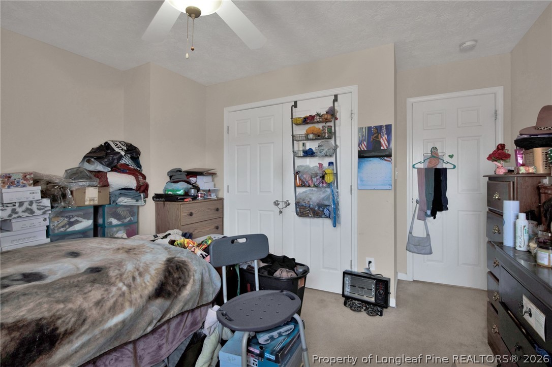 429 Bristlecone Road Fayetteville, NC 28311 - Photo 26 of 38 a bedroom with a bed and furniture