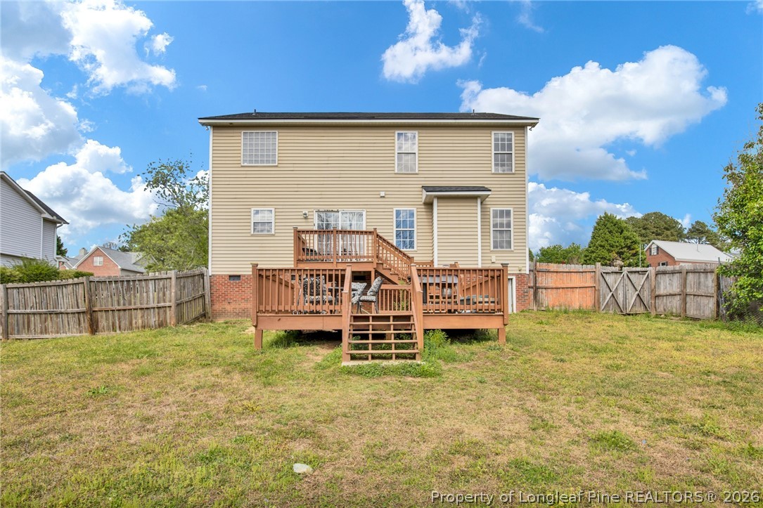 429 Bristlecone Road Fayetteville, NC 28311 - Photo 34 of 38 a view of a house with a backyard porch and sitting area